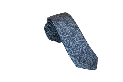 Closeup of an elegant stylish tie rolled and isolated on a white background.