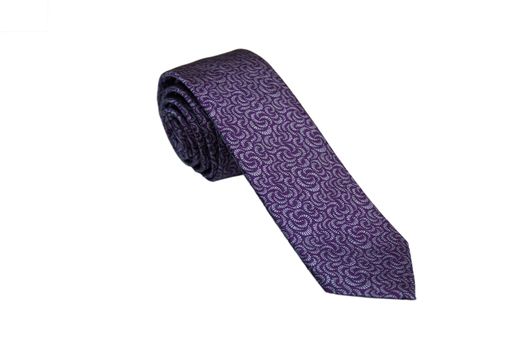 Closeup of an elegant stylish tie rolled and isolated on a white background.