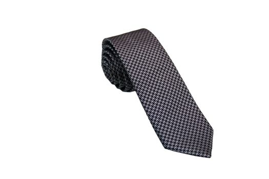 Closeup of an elegant stylish tie rolled and isolated on a white background.