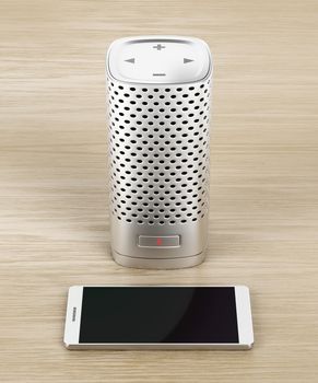 Silver smart speaker and smartphone on wood background 