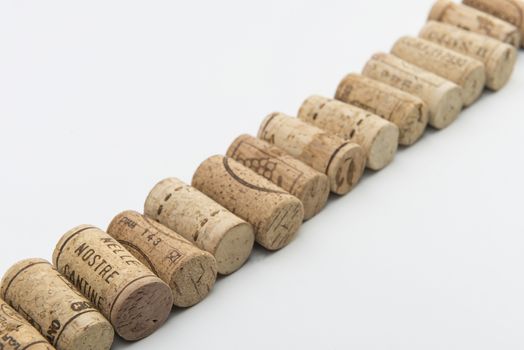 corks on a white floor