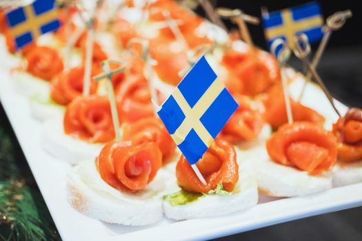 Trays with various delicious appetizer. Appetizer of fish.