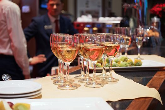 Bar counter with glasses and plates. Glasses on the bar.