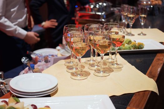 Bar counter with glasses and plates. Glasses on the bar.