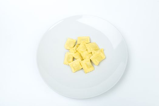 tortellini in a white plate