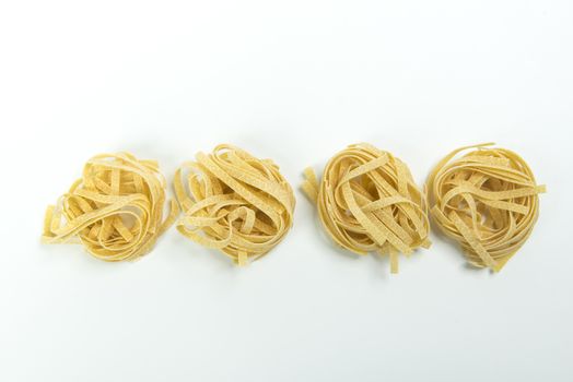 fettuccine pasta on a white table