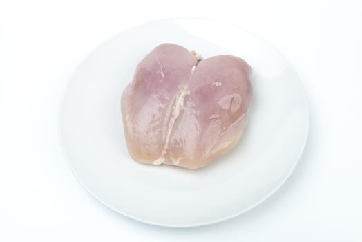 a chicken breast on a white dish