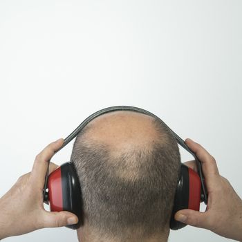 man wearing a headset to protect himself from noise