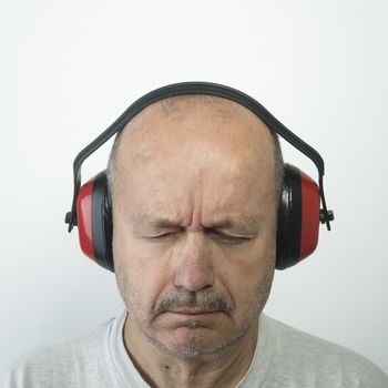 man wearing a headset to protect himself from noise