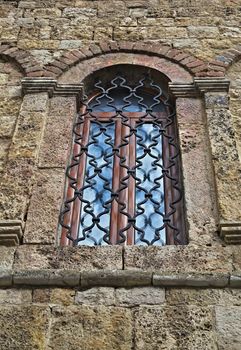 Window on old stone monastery in Serbia