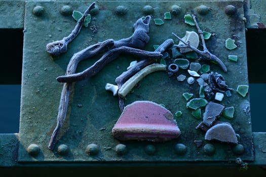 Frozen bits of various material laying on bridge structure