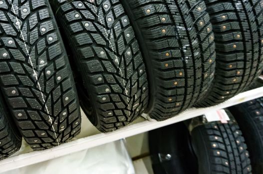 Closeup shot of car tyres on a shelf