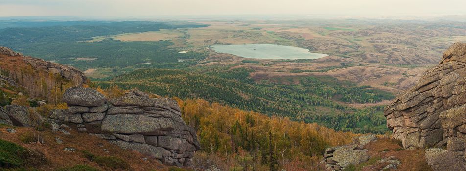 Beauty view on Sinyukha mountain to White lake, the highest mountain of Kolyvan ridge, in the Altai Territory of Russia