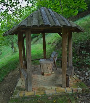 Wooden open hut for relaxing, in park