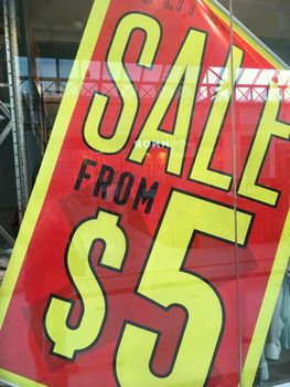 Retail shop front sale sign.  Boxing day sales