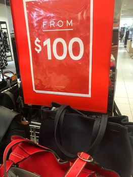 Sale sign for ladies leathergoods handbags