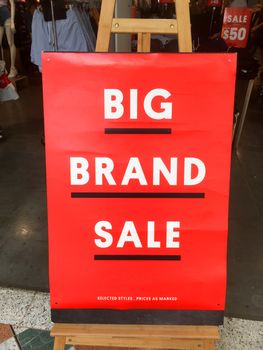 Sale sign outside a retail clothing shop