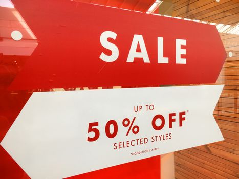 Sale sign advertising up to 50% reduced prices
