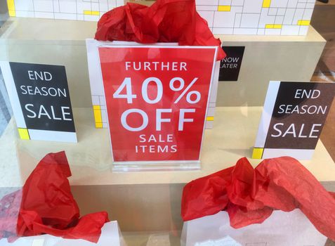 Boxing day and End of Season sale signs in retail shop window