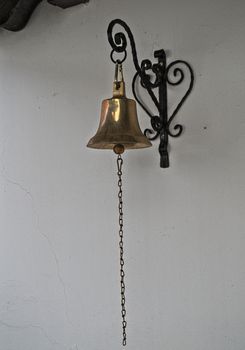 Bell hanging on wall