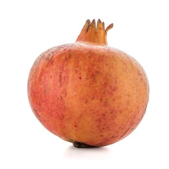 Ripe pomegranate fruit isolated on white background.