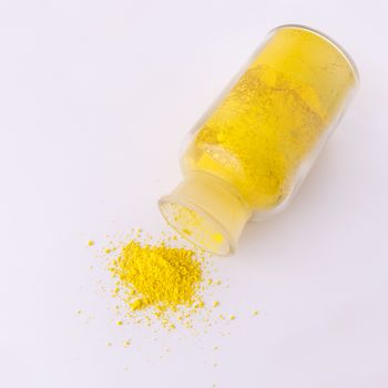 glass containers containing natural yellow colored powder