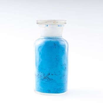 glass containers containing natural blue colored powder