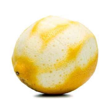 Peeled lemon fruit isolated on white background.