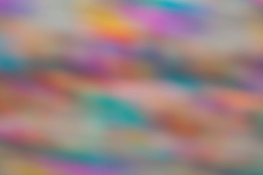 Abstract motion and out of focus blur of vibrant pastel colours.