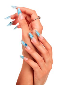 Closeup shot of beautiful female hands with manicured nails, isolated on white background