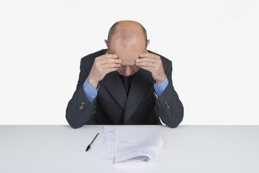 a worried man reading a document