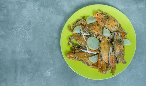 top view of steamed crab on plate ready for served