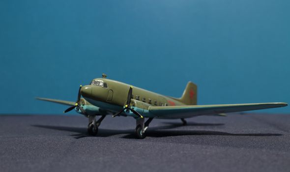 Soviet military transport aircraft Li-2 1937 issue. miniature model