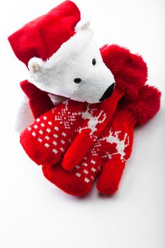 studio quality white background red wool mittens baby winter clothes bear Santa  Claus Christmas gift texture background