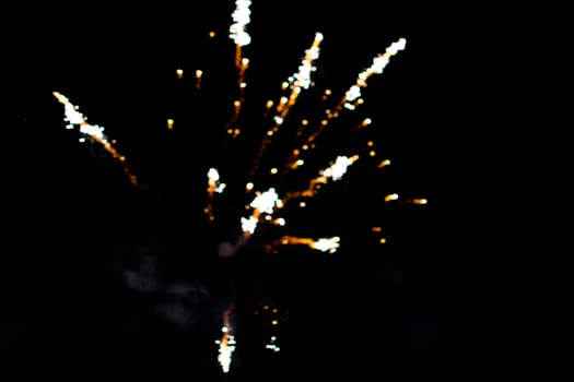 fireworks out of focus bokeh beautiful explosion on black background