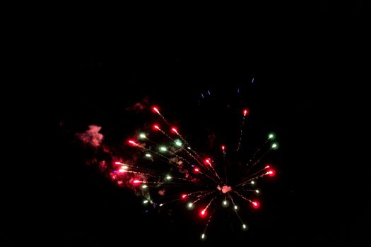 fireworks explosion of color on a dramatic black background focus