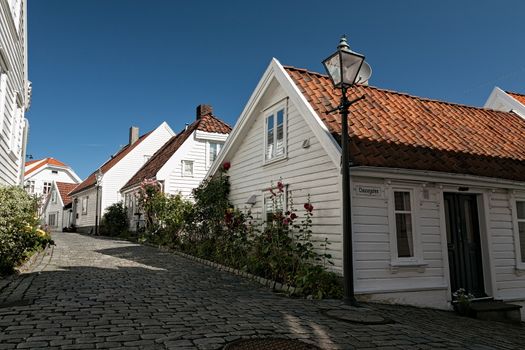 Typical houses and cobblestone street in Stavanger, Norway