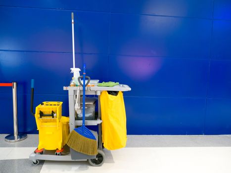 Cleaning tools cart wait for cleaning.Bucket and set of cleaning equipment in the office.