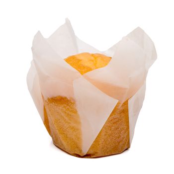 Closeup of a Magdalena Typical Spanish Plain Muffin. Sweet Food or Dessert. Three Fresh Baked Muffin Isolated on White Background in American Style. Irresistible Tasty Cake.