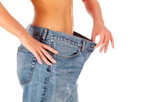 Closeup shot of woman showing her progress after weight loss, isolated on white background