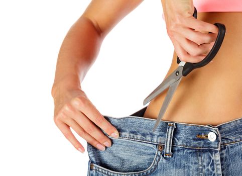 Weight loss concept - closeup shot of woman showing her progress of losing weight. Isolated on white background.