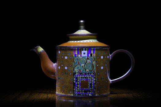 porcelain teapot studio quality black background