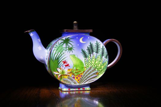 porcelain teapot studio quality black background