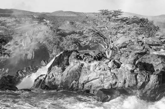 The top of the Ruacana waterfalls on the boder between Angola and Namibia. Monochrome
