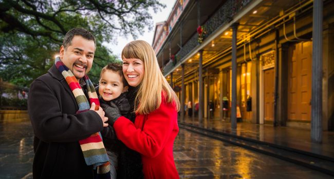 Happy Young Mixed Race Family Enjoying an Evening in New Orleans, Louisiana
