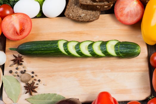 Set of vegetables and spices on kitchen table