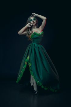 Fashion Art Portrait .Green Make-up and Colorful Bright Nails.