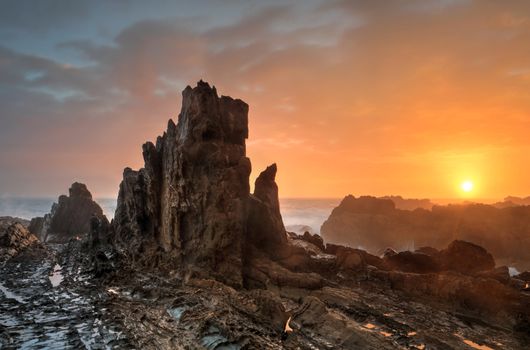 Beautiful sunrise at Bermagui across one of the many fabulous rock formations in the area.