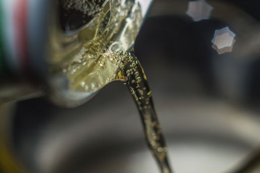 beer close-up macro canned beer in a stream of beer