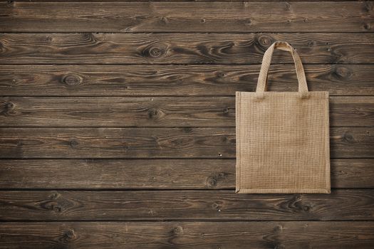 eco bag for shopping on wooden background